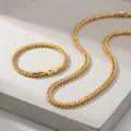 Close-up of 5mm stainless steel wheat chain necklace and bracelet set in gold - Bracelet / Gold
