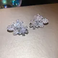 Exquisite silver needle stud earrings featuring sparkling zircon flower and leaf design motifs - Flower Leaf Design / Silver