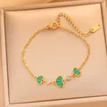 Bracelet élégant en acier titane doré avec breloques cœur à rayures vertes et cristaux - Chaîne de Cœur de Luxe (725) / Cœur de Coquille Verte Dorée (725)
