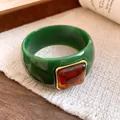 Retro forest green acrylic bangle bracelet featuring a square amber stone inlay design - Irregular Geometric Style / Green And Coffee