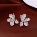 Vintage silver flower stud earrings with shimmering rhinestones for an elegant style - Style 22