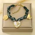 Floral fabric cord bracelet with gold rose heart pendant in dark green style - Rose Heart Star (KN298809-SXSJ) / Dark Green Floral