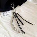 Detailed macro view showing the textured black beads and metallic silver elements - Silver Chain Black Beads / Silver Black
