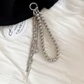 Detail view of silver multi-layered beaded keychain accessory with heart and spike pendant - Heart Spike Round Bead Chain