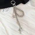 Close-up of a silver-toned metal beaded keychain featuring star charms and dangling chains - Star Spikes Metal Chain