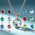 Vista dettagliata di dodici ciondoli portafortuna con collana di cristallo - Oro Rosa-Gennaio