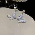 Elegant vintage butterfly drop earrings with silver finish and sparkling pavé crystal accents - 8# Silver Needle - Silver - Blue