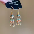 Vintage bohemian tassel earrings with colorful beads and gold-finished leaf pendants - Streaming Flower Tassel (30# Earring Hook-Gold) / Colorful