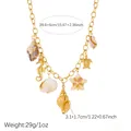 Detail view of gold-plated necklace with ocean-themed shell and sea turtle charms - N4325 Style