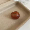 Macro view of a chunky amber resin ring showcasing its unique marbled texture and glossy finish - 25# Amber Brown