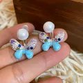 Eleganti orecchini a farfalla vintage con strass colorati e smalto blu chiaro. - 37# Perno in Argento - Argento - Blu
