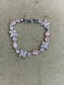 Elegant flower bracelet with pink sparkling zircons and silver finish for women - Pink