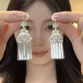 Elegant silver tassel earrings with light green beads, perfect for evening party wear. - Long Green Bead Tassel Style (2#) / Silver-Green
