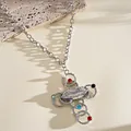 Detail view of retro silver cross necklace featuring unique lip motif and colorful stones - Necklace / Silver