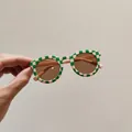 Trendy children's UV protection sunglasses with green and peach checkerboard pattern - Round / Green Plaid