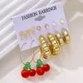 Vintage 6-pair gold earring set featuring cherry charms, pearl studs, and textured hoops - Red Cherry Rhinestone Artificial Pearl Hoop Set (6647401HB)