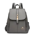 Elegant gray lychee texture faux leather backpack for women with golden kangaroo logo - Gray