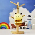 Detail of a soft plush bee keychain with a standard metal hook in a creative toy scene - Little Bee (Standard Clasp) / 12cm