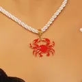 Close-up of vibrant red enamel crab pendant on a white rope chain necklace - Red Crab Pendant White Rope Chain (A-1066) / Gold