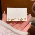 Elegante conjunto de pendientes de estrella y luna en plata S925 con circonitas - Juego Dorado de Luna Estrella y Piedra de Ojo de Gato (E6776金)