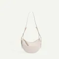 Minimalist off-white crescent crossbody bag with adjustable leather shoulder strap - Chalk White Lychee Pattern