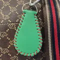 Handmade green faux leather baseball keychain with red stitching for fashion bag charm - Softball Dark Green
