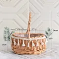 Handwoven natural willow storage picnic basket with white decorative tassel trim and handle - Opening W 18cm x Basket W 20cm x H 24cm / Princess Oval Basket Large (Tassel Lace Style)