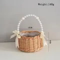 Handmade wicker flower basket featuring elegant pearl handle and cream satin ribbons - 15cm x 9cm (Weight 140g) / Large Pearl Handle (Ribbon Bows)