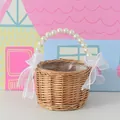 Small decorative woven wicker flower basket with pearl handle and white ribbon bow - Pearl Handle Basket (Silk Yarn Decor)
