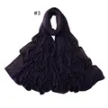 Macro detail of purple jersey scarf featuring elegant golden rhinestone trim edges - 3