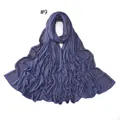 Detail of blue-purple jersey scarf featuring sparkling diamond-like rhinestones - 9