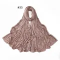 Detail of dusty pink mercerized cotton hijab featuring elegant rhinestone borders - 35