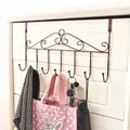 Vintage bronze metal over-the-door hanger with seven hooks for organizing bags and keys - European Vintage Scroll Ironwork / 7 Hooks / Bronze