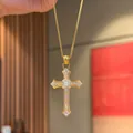 Exquisite goldfarbene Kreuz-Halskette, reich besetzt mit funkelnden Kristallen - Halskette (HXL-0566)