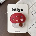 Cute red leather mushroom hair clip accessory with colorful star and bead decorations - Mushroom House