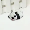 Cute panda shaped silicone cable protector for charging cables in black and white - Panda