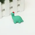 Cute green dinosaur charging cable protector with a red hat for data cable protection - Dinosaur