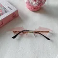 Stylish pink bat-wing shaped rimless sunglasses for women in millennium Y2K style - Pink 24-Pink Bat Wing Rimless Style