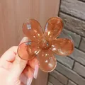 Translucent brown flower-shaped hair claw clip for elegant styling accessories - Caramel Brown