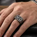 Close-up detail of men's stainless steel MC signet ring with vintage textured finish. - US 7 / Vintage Silver MC
