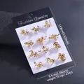 12-piece gold Chinese zodiac brooch set with white pearls on elegant display card - KC Gold Twelve Zodiac Artificial Pearl Style (KZ066-1)