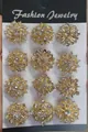 Set of 12 gold flower and star brooches with rhinestones on a white card display - KC Gold White Rhinestone Vintage Mixed Style (KZ060-1)