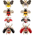 Set of eight elegant gold bee brooches with sparkling crystals and enamel finishes - 8-Piece Bee Brooch Set (KZ070)