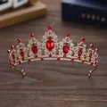 Golden bridal tiara with red pear-cut stones and white crystals on a vine base - Gold + Bright Red