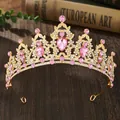 Golden bridal tiara with pink crystals and rhinestones on dark vintage wood background - Gold + Pink Zirconia