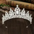 Elegant silver bridal crown with intricate baroque patterns and sparkling teardrop crystals - Silver + White Zirconia