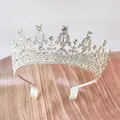 Silver crystal bridal tiara with rhinestones and hair combs on a wood surface - Style 5 Silver White