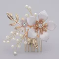 Exquisite handmade bridal hair comb featuring pearls and crystals on a gold base. - Simple Floral And Leaf Photography Comb Hs-j6455