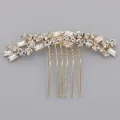 Elegant gold bridal hair comb featuring sparkling rhinestone floral leaf design motifs - Gold Rhinestone Claw Chain Hair Comb Hs-j7078g