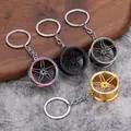 Premium zinc alloy car wheel hub keychains in iridescent, gold, black and silver finish - Silver